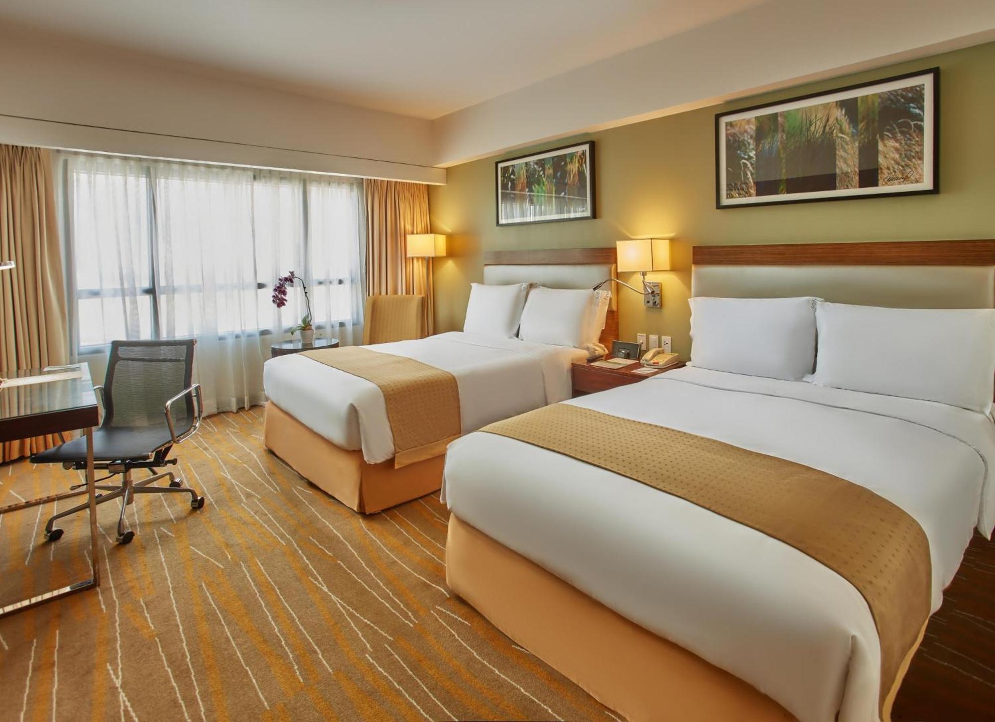 Holiday Inn & Suites Makati By Ihg San Pedro Makati Exterior foto Deluxe Room